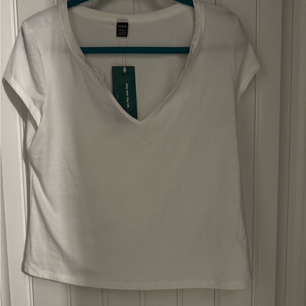 White v neck shirt